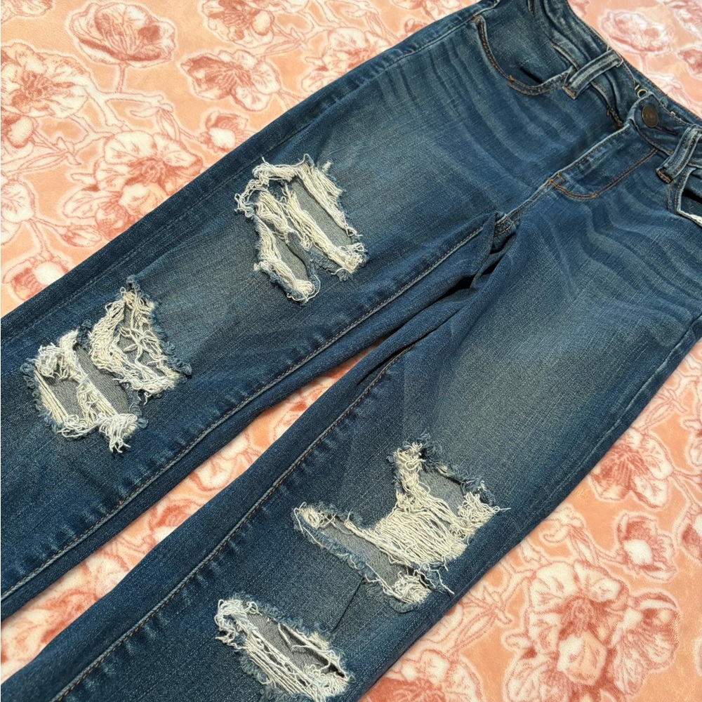 Distressed Blue Jeans